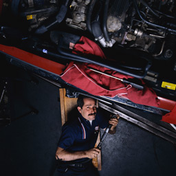 Technician Working on Vehicle